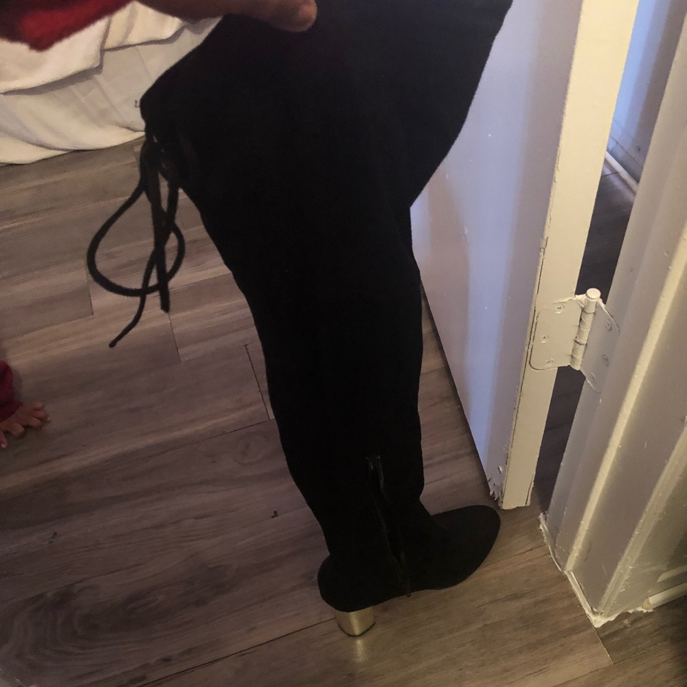High knee black boots